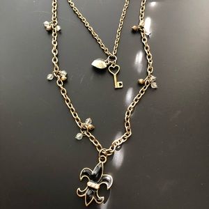 GUESS • Gold and black layered necklace